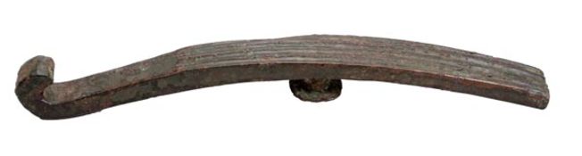 A Warring States-early Han dynasty bronze belt hook of typical curled form with a simple ribbed