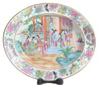 A Canton famille rose Export dish,  18th-19th century of deep oval form decorated in a typical