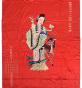 A large red ground silk panel, late Qing dynasty, embroidered with the female immortal, Magu,
