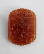 A carved agate abstinence plaque, 19th century, rendered in a caramel brown stone and carved to one