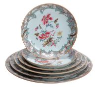 A suite of six famille rose dishes, 18th-19th century, each of circular form and decorated in a