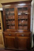 A late Victorian mahogany glazed bookcase 213cm high, 122cm wide