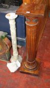A walnut torchere in the form of a classical column and another marble pedestal, damaged.