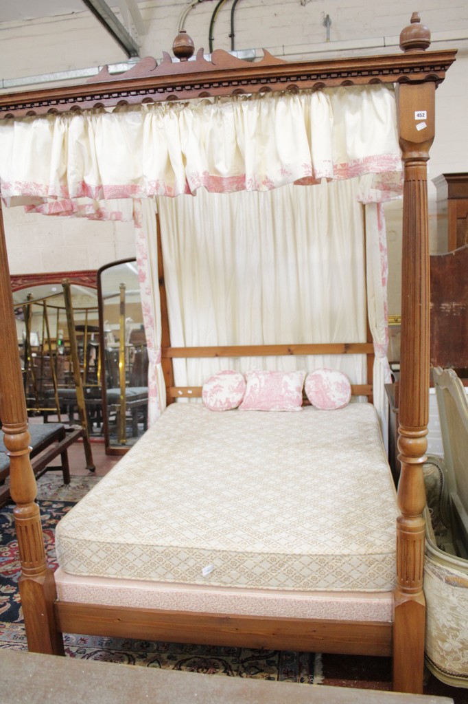 An 18th century style mahogany framed four poster bed with fluted column front posts with base and