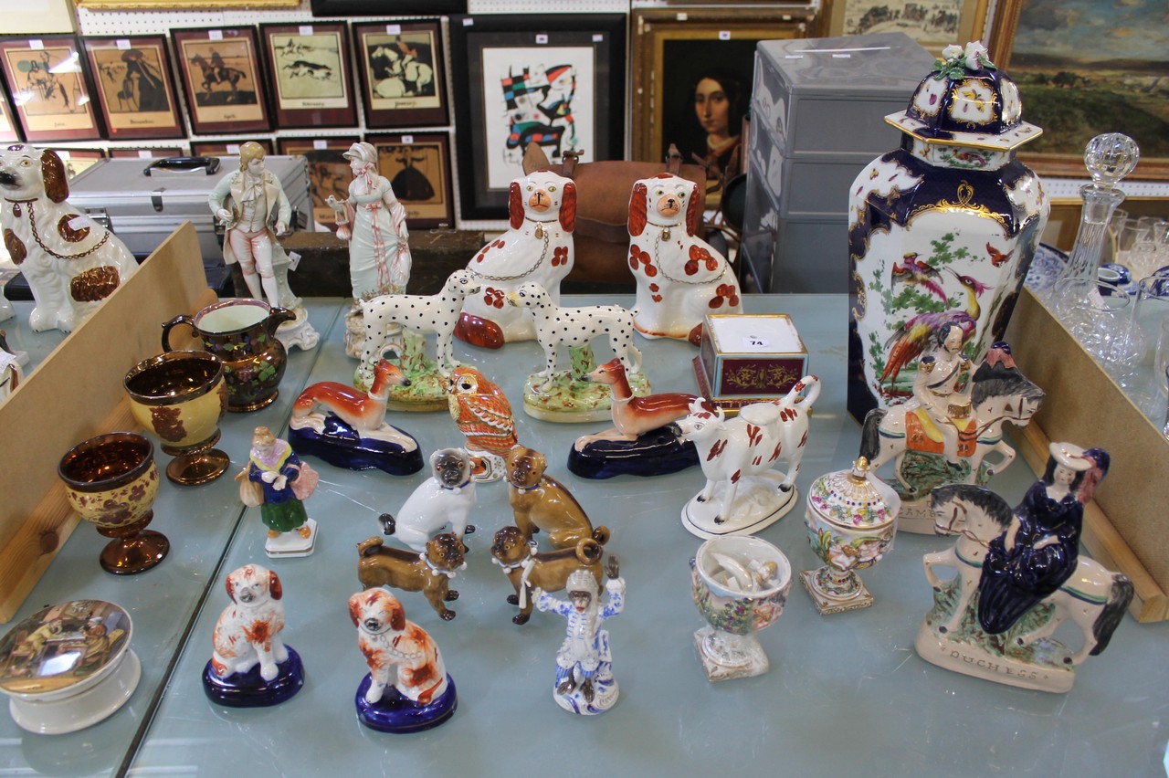 A group of mixed ceramics to include a pair of hearth dogs, a Continental porcelain monkey band