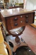 A Victorian mahogany two drawer work table (lacking box)