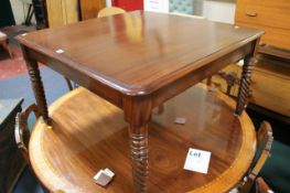 A reproduction mahogany table with spirally turned legs Best Bid