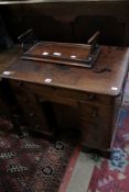 A 19th century mahogany small kneehole desk and book stand