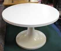 A circular table modern table in the Arne Jacobsen style originally bought in 1972 from Maggs in