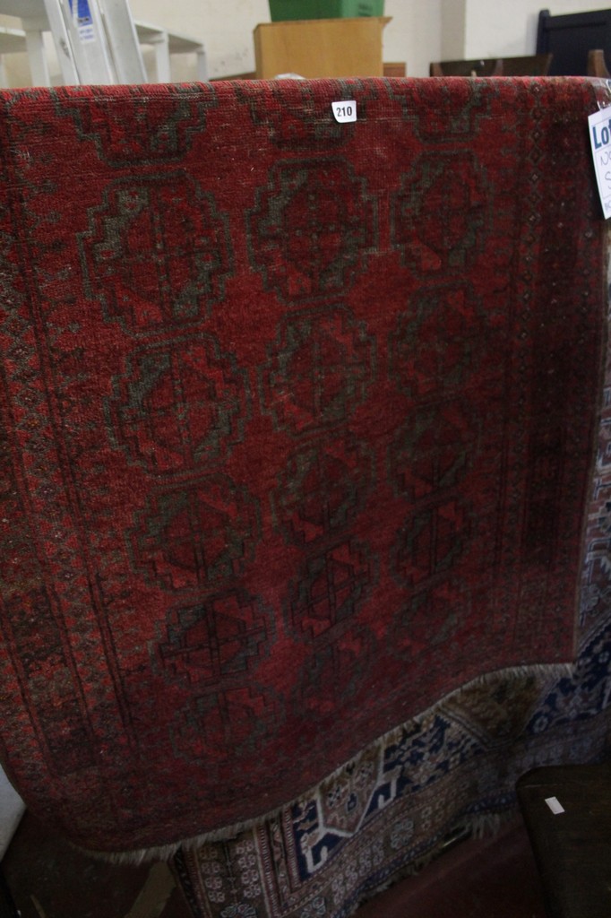 A Caucasian rug, together with another with 24 guls