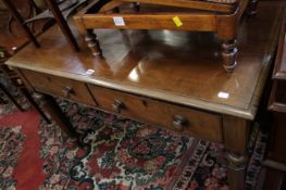 A 19th century mahogany side table with two frieze drawers.