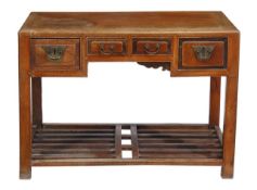 A Chinese elm side table, with four frieze drawers, on square supports above slatted undertier,