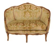 A Louis VI style three piece salon suite, walnut show wood frame with floral cut velvet upholstery