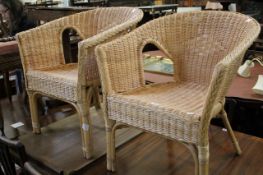 A pair of caned armchairs  Best Bid