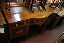 A Sheraton style mahogany and inlaid bowfront sideboard with a central drawer flanked by drawers