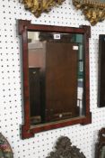 A mahogany and parcel gilt mirror with re-entrant corners 52 x 41cm and a George III mahogany