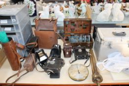 A mixed quantity of vintage photographic equipment and scientific instruments etc.