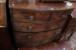 A 19th century mahogany bow front chest of drawers with two short over three long drawers.