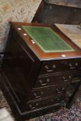 A mahogany finished two drawer filing cabinet. Best Bid
