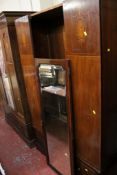 An Edwardian Sheraton revival inlaid wardrobe with central mirror door above long drawer Best Bid