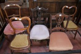 A pair of Victorian balloon back chairs and three further chairs