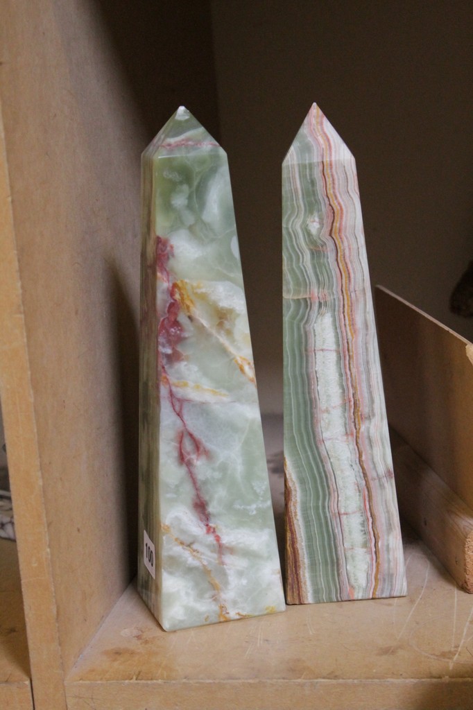 A pair of onyx obelisks; 31cm high