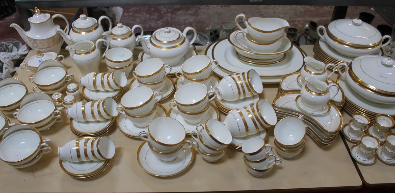 An extensive quantity of Mintons and other white and gilt dinner and tea ware An extensive Minton `