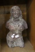 A carved stone figure, Indian; 30cm high