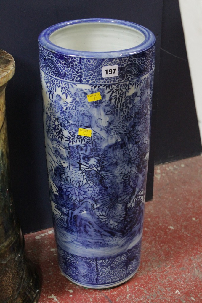 A blue and white Japanese porcelain stick stand; 61cm high
