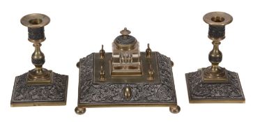 A Victorian patinated metal three piece desk set