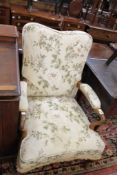 An easy chair with sherpherd`s crock arms and cabriole legs Best Bid