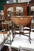 A brass umbrella stand and occasional table  Best Bid