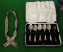 A cased set of six silver spoons (one missing), Indian silver object and a quantity of plated
