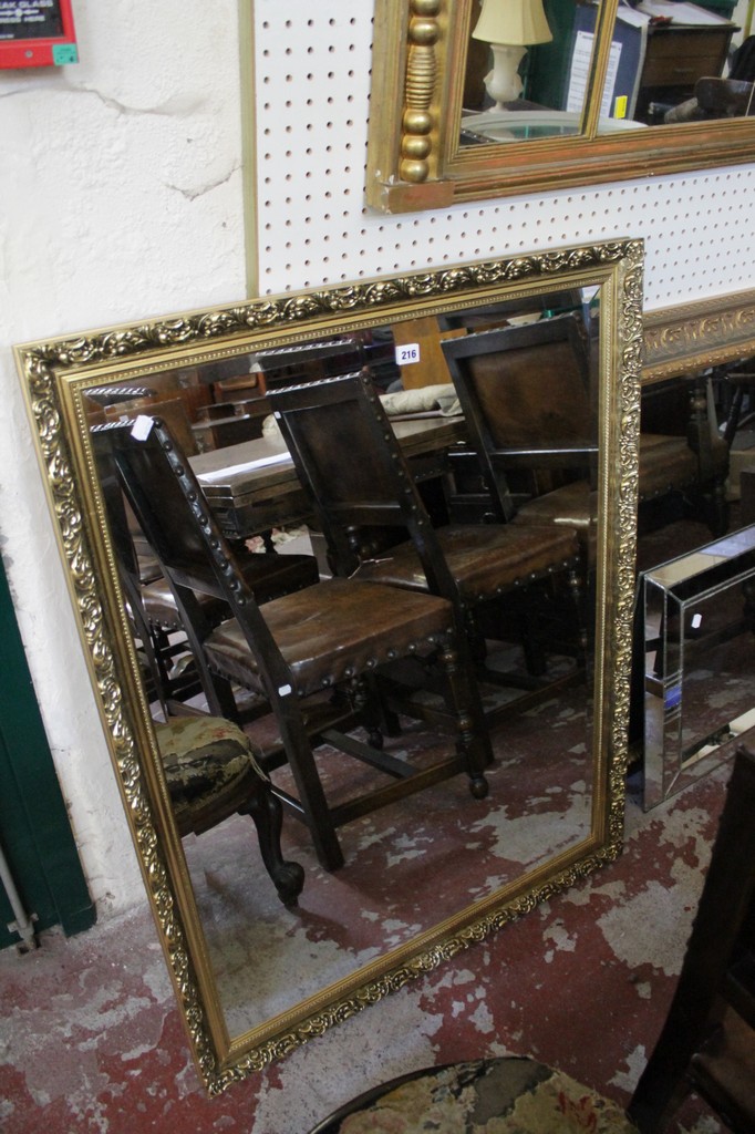 Two gold framed mirrors and a leaded mirror.