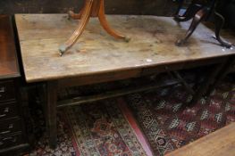 A 17th Century style elm top refectory table.