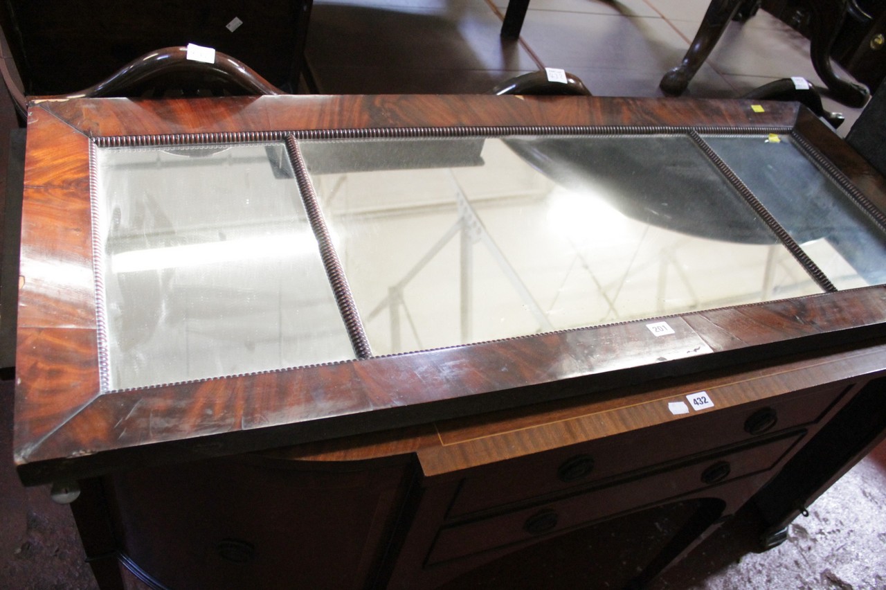 A 19th Century  mahogany triple plate mirror 57cm high, 140cm wide