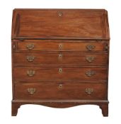 A George III mahogany bureau the top drawer fitted,  with three further long graduated drawers on