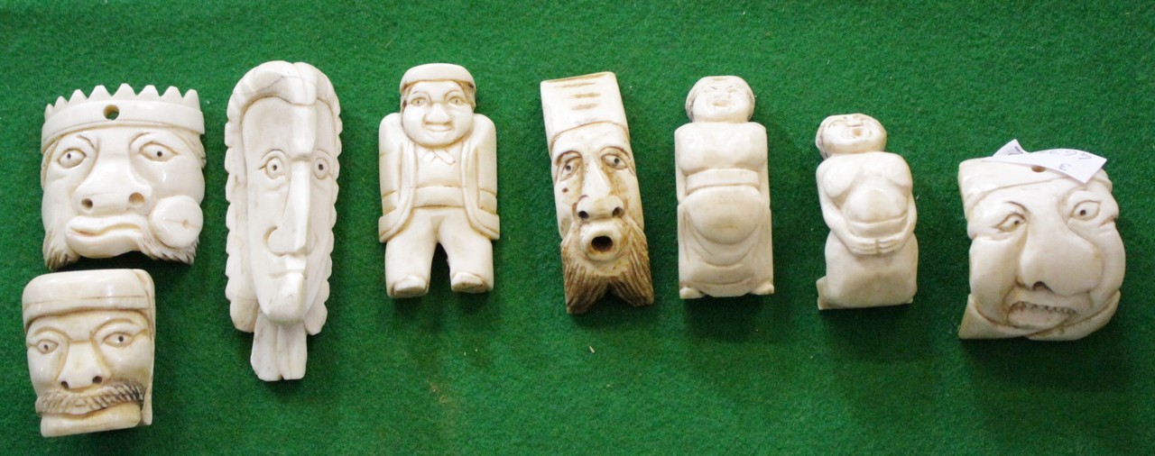 A small quantity of carved Oriental ivory pieces