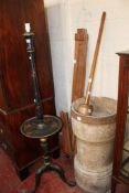 An artists easel, large rustic pestle and mortar, chinoiserie standard lamp,and a glass flagon