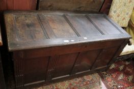 A large 19th Century oak coffer with fluted column panels.145cm wide.