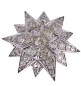 A diamond star brooch, the domed star set with old cut diamonds, 3  A diamond star brooch,   the