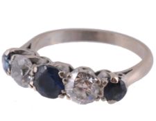 A sapphire and diamond five stone ring , the round cut sapphires interspaced...  A sapphire and