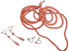 A coral necklace, the single strand necklace composed of graduated coral beads  A coral