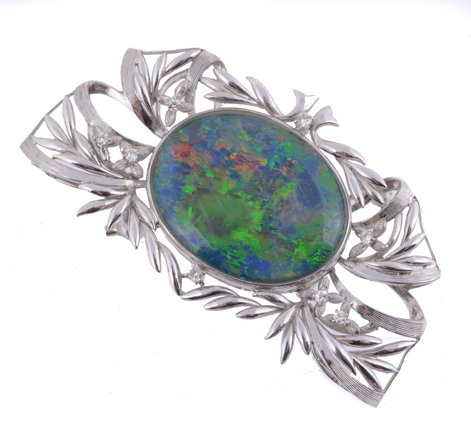 An opal triplet and diamond brooch/slide, the oval opal triplet panel within...  An opal triplet and