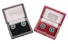 A pair of diamond set earrings, the circular panels set with a reeded...  A pair of diamond set
