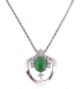 A diamond and jadeite pendant, the oval cabochon jadeite panel with a...  A diamond and jadeite