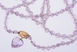 An amethyst bead necklace, composed of faceted amethyst beads  An amethyst bead necklace,   composed