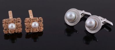 A pair of cultured pearl cufflinks , the rectangular textured panels each...  A pair of cultured