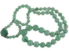 A single strand jadeite bead necklace, the sixty six graduated 4  A single strand jadeite bead