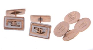 A pair of double sided cufflinks, the two colour rectangular panels set with...  A pair of double
